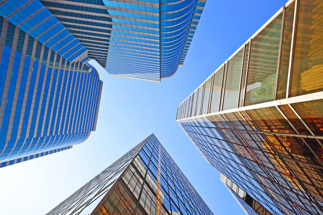 Glass office towers viewed from below